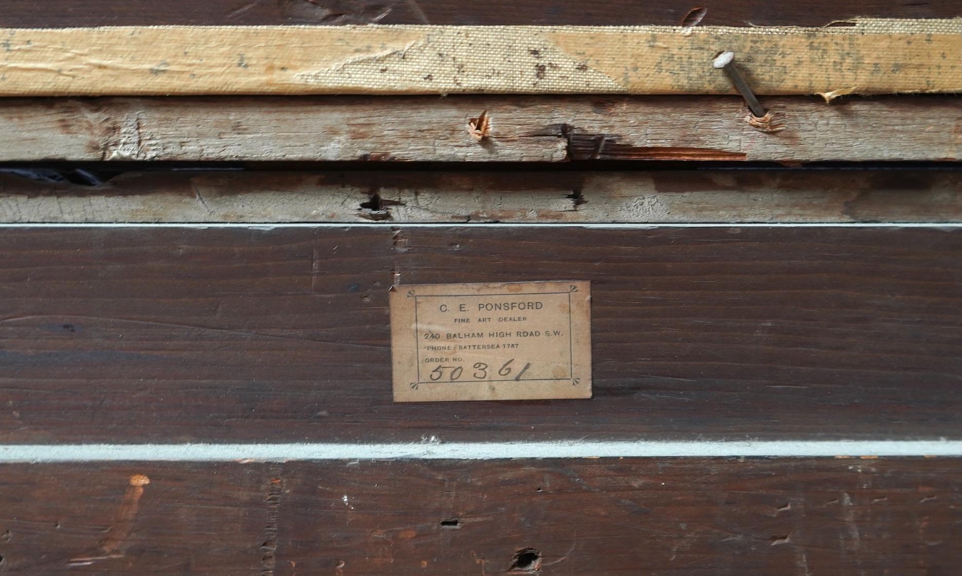 English School, 19th century, A still life study of flowers and fruit before a landscape